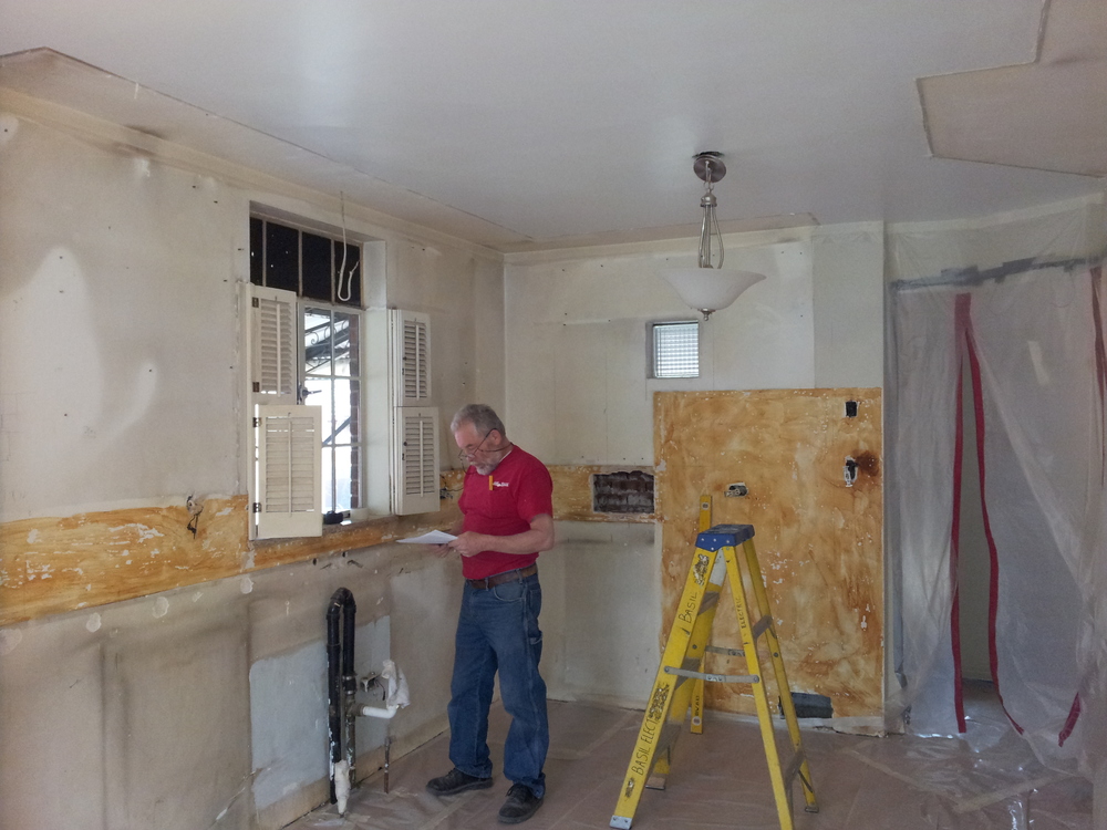 Kitchen after demo, prior to electrical relocates, and patch back